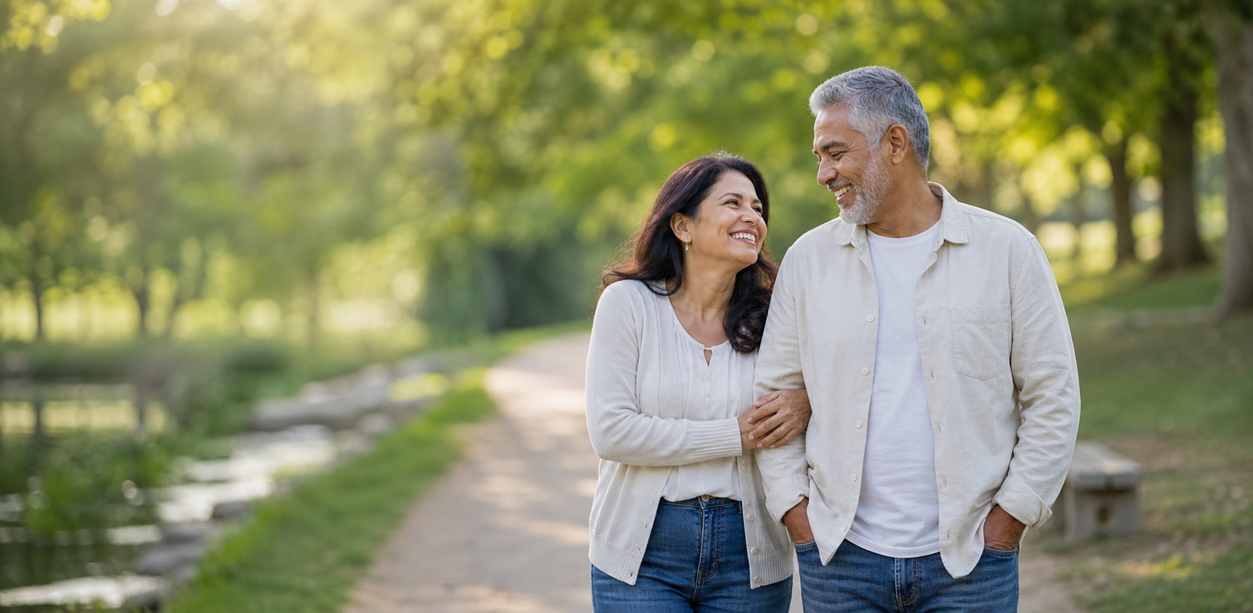 Happy senior couple walking together in a park